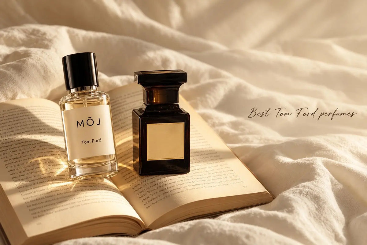 	MOJ Tom Ford inspired perfume beside a Tom Ford bottle on an open book